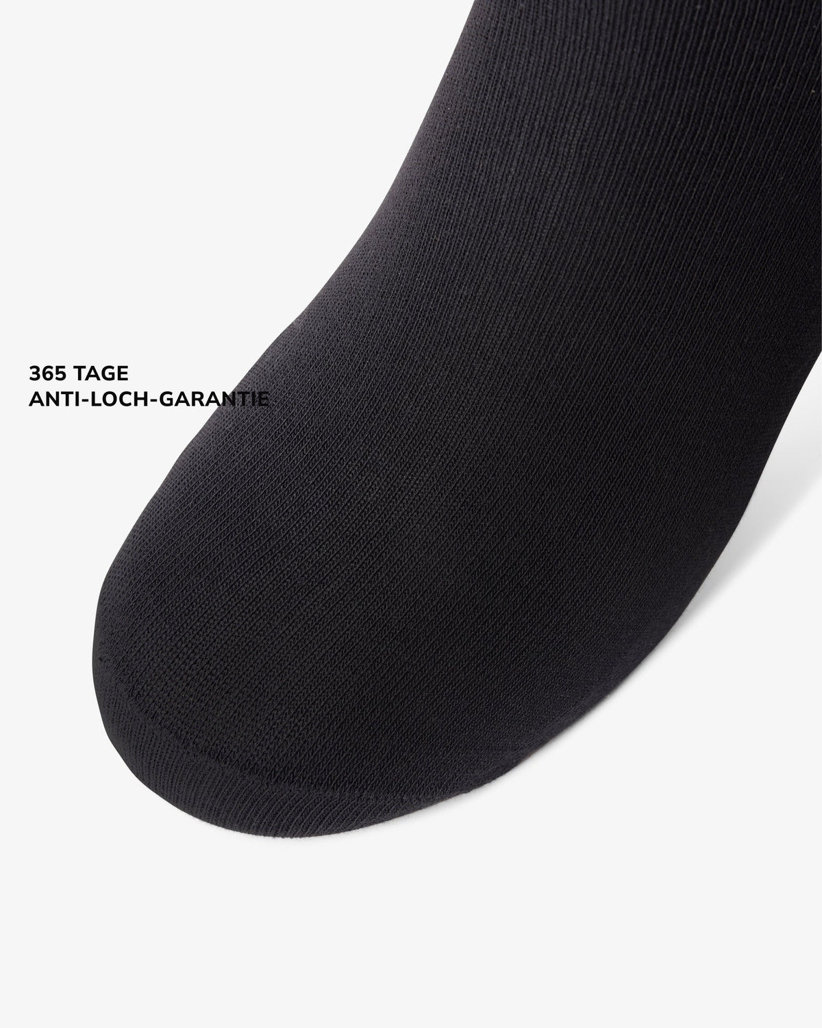 Spitze der schwarzen Bambus-Kurzsocke im Detail, 365 Tage Anti-Loch-Garantie