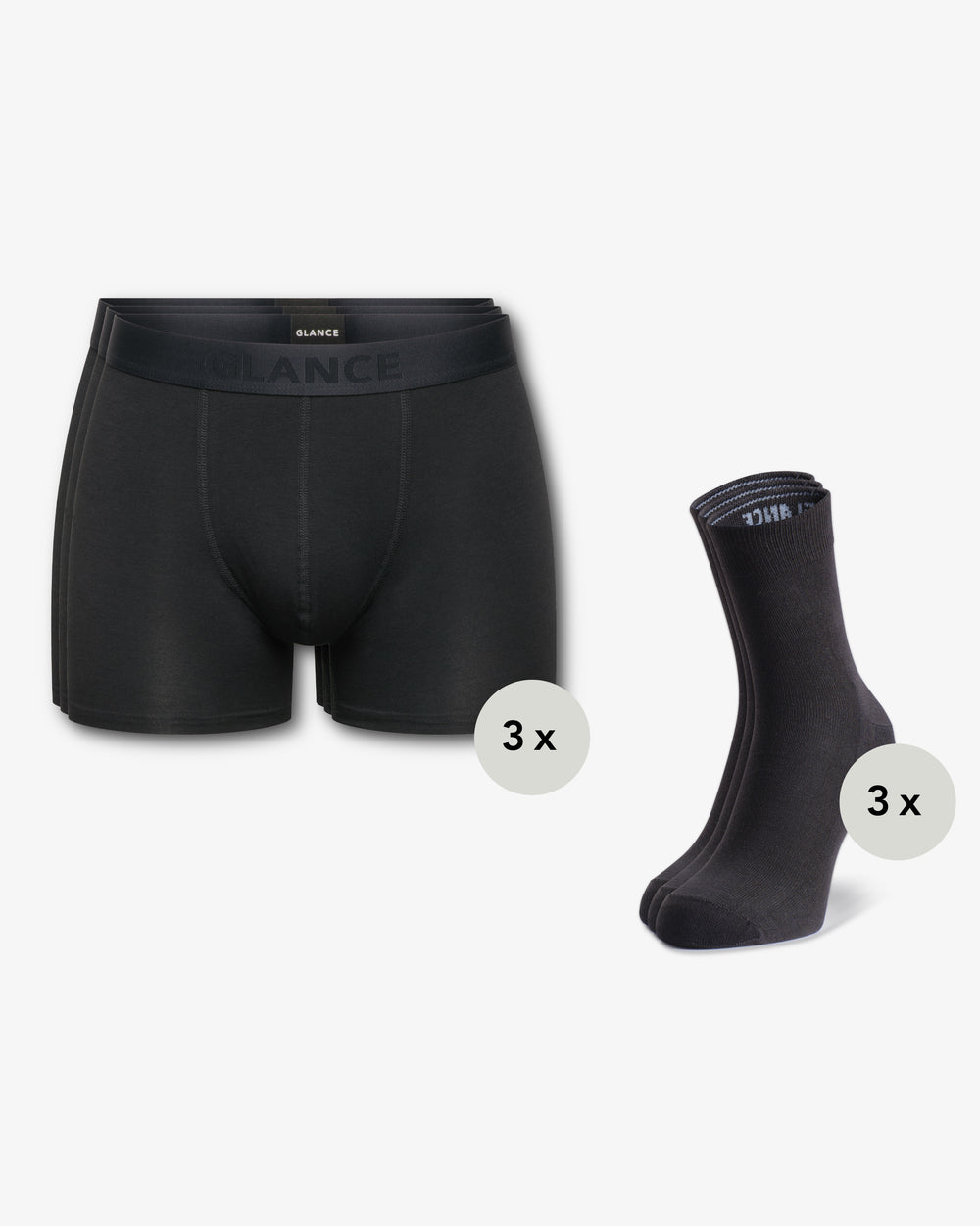 Set aus drei Bambus-Boxershorts und drei Paar Socken in Schwarz